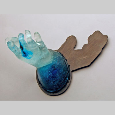 Hands & Hanging - Alms for the Soul - A hand with toes for fingers. Cast glass & steel
