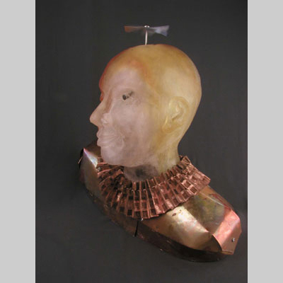 Portraits & People - Brainstorm - The light within as fuel for the pinwheel's spin (both literally and figuratively). Kiln-Cast lead crystal, copper, aluminum & light