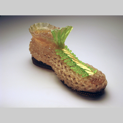 Shoes & Socks - Old Fashioned - One of many extra large shoes inspired by the lyrics from a Tom Lehrer song, The Wiener Schnitzel Waltz. Kiln-Cast lead crystal knitted glass