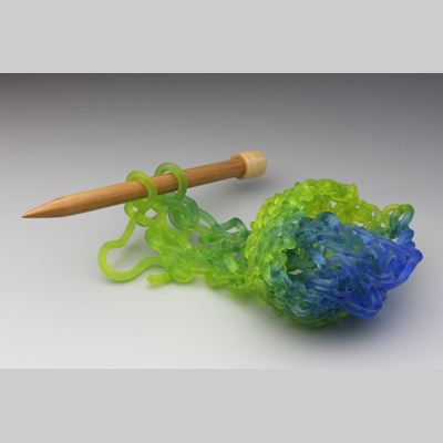 Knitting & Knitted - Tied kiln cast lead crystal & knitting needles
