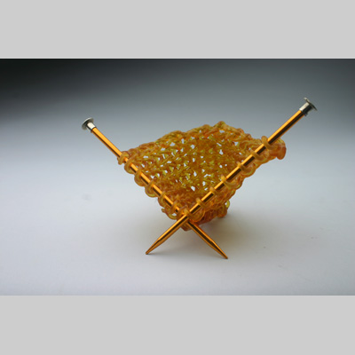 Knitting & Knitted - Vane kiln cast lead crystal & knitting needles