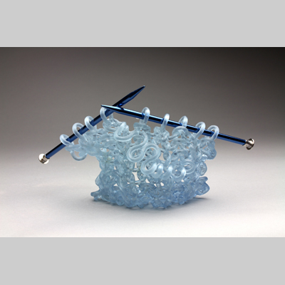 Knitting & Knitted - Ringlet kiln cast lead crystal & knitting needles