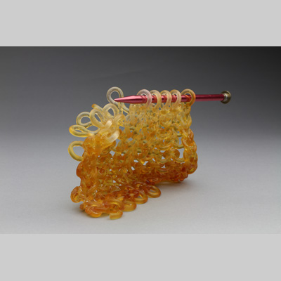 Knitting & Knitted - IPA - Like foamy beer kiln cast lead crystal & knitting needles