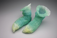 Free and Easy, kiln cast lead crystal, cast glass, Carol Milne, socks, knitted glass