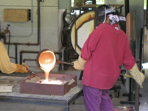 pouring hot cast glass